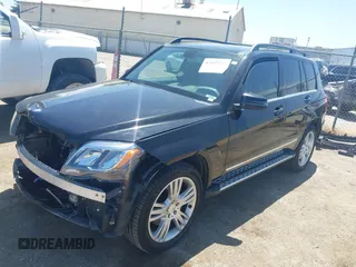 2013 Mercedes-Benz GLK with VIN WDCGG8JBXDG051067, listed as a IAAI auction lot 42107151 with 123,576 mi miles. Bid and sale history available at carsss.com. Image 2.