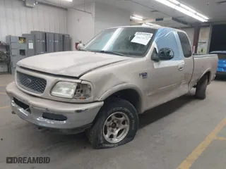 1998 Ford F-150 Standard with VIN 1FTZX18W6WKA83626, listed as a IAAI auction lot 40625179 with 343,403 mi miles. Bid and sale history available at carsss.com. Image 2.