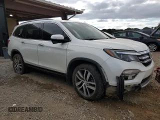 2017 Honda Pilot Touring z VIN 5FNYF6H92HB067140, wystawiony jako Copart lot #72200584 z przebiegiem 127 856 mil mil oraz Szkoda całkowita • Salvage title. Historia ofert i sprzedaży dostępna na DreamBid. Obrazek 4.