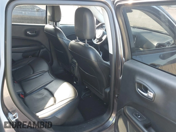 2020 Jeep Compass Limited z VIN 3C4NJCCB7LT170817, wystawiony jako IAAI lot #40180517 z przebiegiem 91 371 mil mil oraz . Historia ofert i sprzedaży dostępna na DreamBid. Obrazek 8.