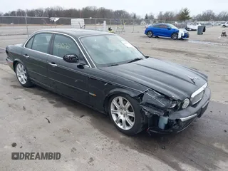 2004 Jaguar XJ with VIN SAJWA71C14SG20122, listed as a IAAI auction lot 41685767 with 113,392 mi miles. Bid and sale history available at carsss.com. Image 1.