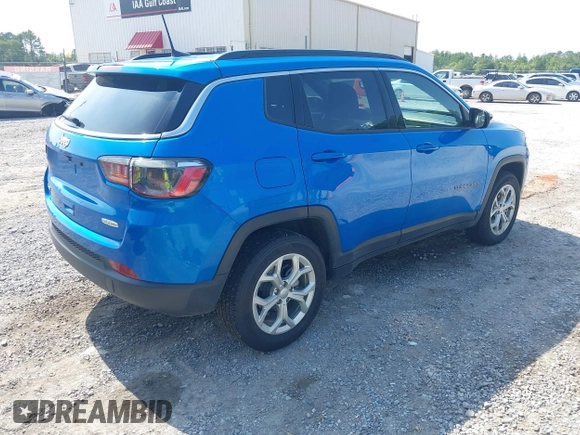 2024 Jeep Compass Latitude with VIN 3C4NJDBN8RT119496, listed as a IAAI auction lot 42608637 with 32,417 mi miles and . Bid and sale history available at DreamBid. Image 4.