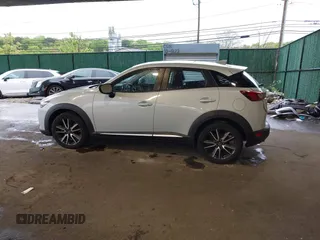 2016 Mazda CX-3 Grand Touring z VIN JM1DKBD71G0126151, wystawiony jako IAAI lot #42215837 z przebiegiem 81 349 mil mil oraz . Historia ofert i sprzedaży dostępna na DreamBid. Obrazek 14.