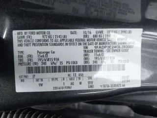 2016 Ford Focus S with VIN 1FADP3E24GL393007, listed as a IAAI auction lot 41522844 with 91,800 mi miles. Bid and sale history available at carsss.com. Image 9.