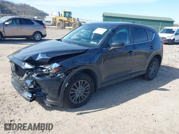 2019 Mazda CX-5 Touring with VIN JM3KFBCM8K0518806, listed as a IAAI auction lot 42038168 with 61,449 mi miles and . Bid and sale history available at DreamBid. Image 17.