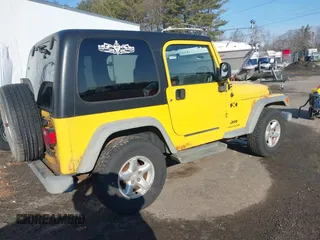 2005 Jeep Wrangler X with VIN 1J4FA39S25P374373, listed as a IAAI auction lot 41754017 with 195,156 mi miles. Bid and sale history available at carsss.com. Image 4.