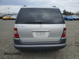 1999 Mercedes-Benz M 320/430/500 z VIN 4JGAB54E2XA142741, wystawiony jako Copart lot #45057045 z przebiegiem 72 285 mil mil oraz Szkoda całkowita • Salvage title. Historia ofert i sprzedaży dostępna na DreamBid. Obrazek 6.