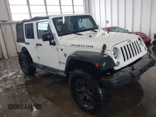 2016 Jeep Wrangler Unlimited Rubicon with VIN 1C4HJWFG4GL127379, listed as a IAAI auction lot 41732688 with 110,193 mi miles. Bid and sale history available at carsss.com. Image 1.