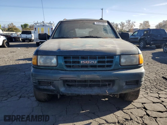 1999 Isuzu Rodeo S with VIN 4S2CK58W1X4349947, listed as a Copart auction lot 84634064 with 135,851 mi miles and Clean Title. Bid and sale history available at DreamBid. Image 5.