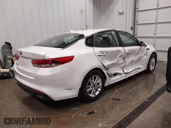 2016 Kia Optima LX with VIN 5XXGT4L38GG048180, listed as a IAAI auction lot 41923650 with 58,018 mi miles. Bid and sale history available at carsss.com. Image 4.