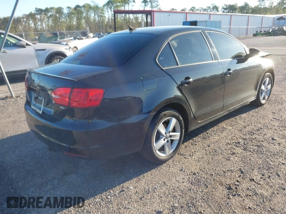 2012 Volkswagen Jetta Sedan TDI with VIN 3VW3L7AJ0CM409148, listed as a IAAI auction lot 41796513 with 167,269 mi miles. Bid and sale history available at carsss.com. Image 4.