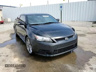 2012 Scion tC z VIN JTKJF5C76C3034769, wystawiony jako Copart lot #52517495 z przebiegiem 205 501 mil mil oraz Nie do naprawy • Non repairable. Historia ofert i sprzedaży dostępna na DreamBid. Obrazek 13.