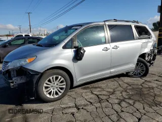 2014 Toyota Sienna XLE with VIN 5TDYK3DC4ES412719, listed as a Copart auction lot 49349495 with 189,774 mi miles and Salvage Title. Bid and sale history available at carsss.com. Image 1.