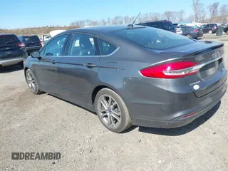 2017 Ford Fusion SE z VIN 3FA6P0HD8HR211638, wystawiony jako IAAI lot #42029399 z przebiegiem 90 262 mil mil oraz . Historia ofert i sprzedaży dostępna na DreamBid. Obrazek 3.