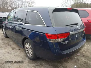 2016 Honda Odyssey SE with VIN 5FNRL5H38GB111448, listed as a IAAI auction lot 41754302 with 114,282 mi miles and . Bid and sale history available at DreamBid. Image 3.