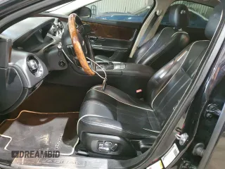 2014 Jaguar XJ with VIN SAJWA1CZ0E8V61168, listed as a Copart auction lot 54383215 with 137,724 mi miles and Salvage Title. Bid and sale history available at DreamBid. Image 7.
