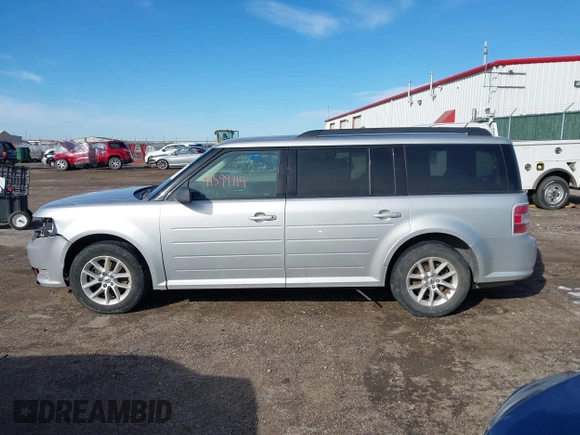 2016 Ford Flex SE z VIN 2FMGK5B8XGBA23900, wystawiony jako IAAI lot #41599714 z przebiegiem 102 961 mil mil oraz . Historia ofert i sprzedaży dostępna na DreamBid. Obrazek 14.