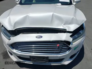 2016 Ford Fusion Titanium z VIN 3FA6P0SU1GR116118, wystawiony jako IAAI lot #42685489 z przebiegiem 138 690 mil mil oraz . Historia ofert i sprzedaży dostępna na DreamBid. Obrazek 6.