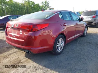 2012 Kia Optima LX with VIN 5XXGM4A76CG027180, listed as a IAAI auction lot 42143209 with 175,028 mi miles and . Bid and sale history available at carsss.com. Image 4.