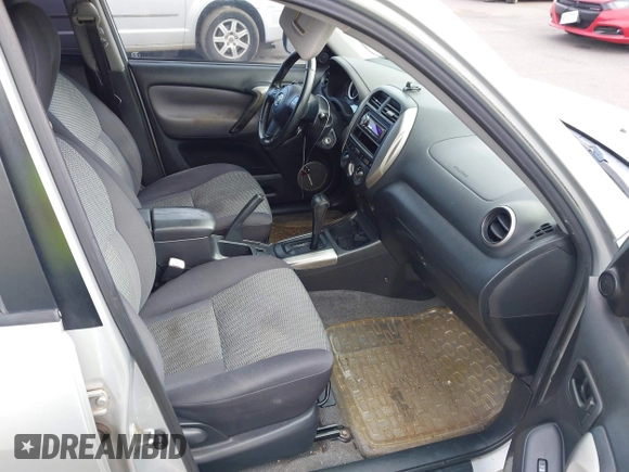 2005 Toyota RAV4 with VIN JTEGD20VX50047632, listed as a IAAI auction lot 41827122 with 214,716 mi miles. Bid and sale history available at carsss.com. Image 5.