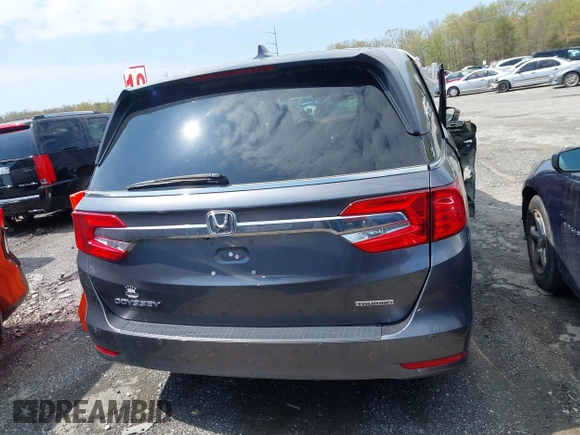 2018 Honda Odyssey Touring with VIN 5FNRL6H8XJB029570, listed as a IAAI auction lot 41485794 with 77,601 mi miles. Bid and sale history available at carsss.com. Image 16.