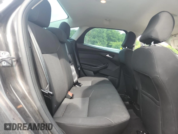 2016 Ford Focus SE z VIN 1FADP3F28GL267618, wystawiony jako Copart lot #58920765 z przebiegiem 157 980 mil mil oraz Szkoda całkowita • Salvage title. Historia ofert i sprzedaży dostępna na DreamBid. Obrazek 10.