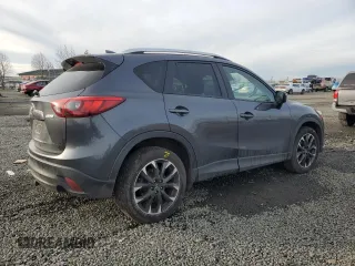 2016 Mazda CX-5 Grand Touring with VIN JM3KE4DY0G0876540, listed as a Copart auction lot 42132815 with 110,158 mi miles and Salvage Title. Bid and sale history available at DreamBid. Image 3.
