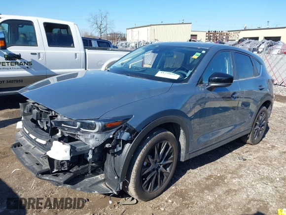 2023 Mazda CX-5 2.5 S Carbon Edition with VIN JM3KFBCM2P0277803, listed as a IAAI auction lot 41758982 with 15,745 mi miles. Bid and sale history available at carsss.com. Image 2.