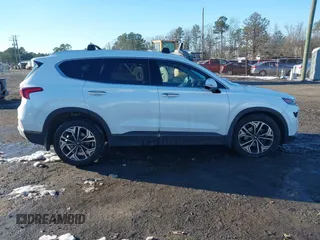 2020 Hyundai Santa Fe Limited with VIN 5NMS5CAA1LH261760, listed as a IAAI auction lot 41293649 with 119,153 mi miles. Bid and sale history available at carsss.com. Image 13.