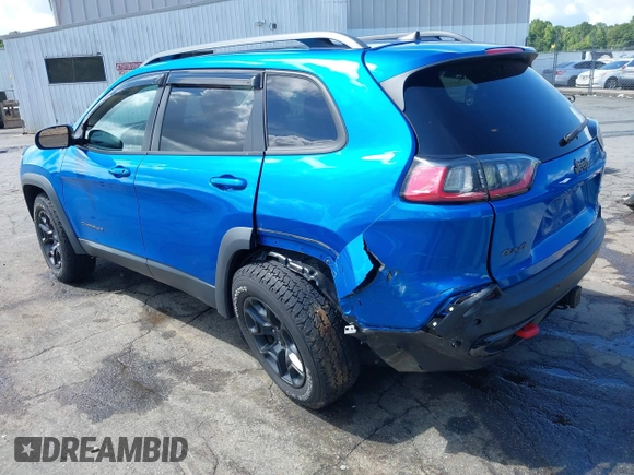 2019 Jeep Cherokee Trailhawk z VIN 1C4PJMBX1KD336247, wystawiony jako IAAI lot #42646549 z przebiegiem 61 636 mil mil oraz . Historia ofert i sprzedaży dostępna na DreamBid. Obrazek 3.