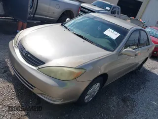 2003 Toyota Camry LE with VIN 4T1BE32K13U787169, listed as a IAAI auction lot 41510710 with 193,197 mi miles and . Bid and sale history available at DreamBid. Image 2.