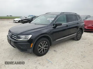 2020 Volkswagen Tiguan SE z VIN 3VV3B7AX1LM053000, wystawiony jako Copart lot #50432565 z przebiegiem 51 328 mil mil oraz Czysty tytuł • Clean title. Historia ofert i sprzedaży dostępna na DreamBid. Obrazek 1.