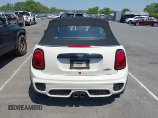 2021 MINI Convertible with VIN WMWWJ9C0XM3M07302, listed as a IAAI auction lot 42027854 with 30,921 mi miles and . Bid and sale history available at DreamBid. Image 16.