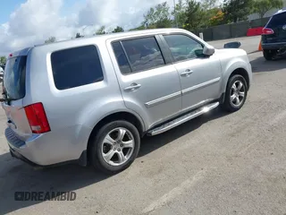 2012 Honda Pilot EX-L with VIN 5FNYF3H5XCB016571, listed as a IAAI auction lot 41905676 with 146,457 mi miles. Bid and sale history available at carsss.com. Image 4.