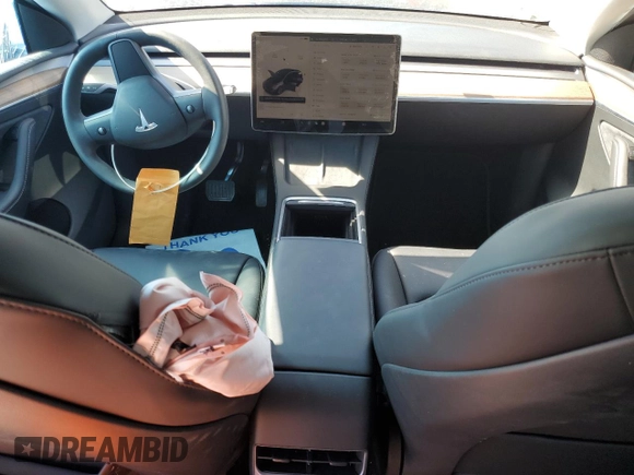 2023 Tesla Model Y Long Range z VIN 7SAYGDEE3PF862038, wystawiony jako Copart lot #57639325 z przebiegiem 11 020 mil mil oraz Szkoda całkowita • Salvage title. Historia ofert i sprzedaży dostępna na DreamBid. Obrazek 8.