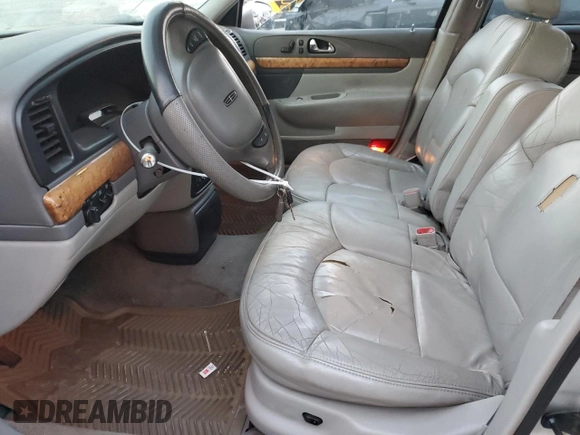 2002 Lincoln Continental with VIN 1LNHM97VX2Y672516, listed as a Copart auction lot 75595354 with 154,361 mi miles and Salvage Title. Bid and sale history available at carsss.com. Image 7.
