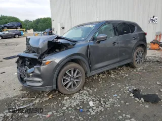 2018 Mazda CX-5 Grand Touring with VIN JM3KFBDM2J0369807, listed as a Copart auction lot 63922475 with 148,194 mi miles and Salvage title. Bid and sale history available at DreamBid. Image 1.