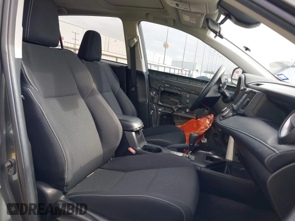 2018 Toyota RAV4 XLE with VIN 2T3WFREV4JW417555, listed as a IAAI auction lot 41092589 with 93,788 mi miles and . Bid and sale history available at DreamBid. Image 5.