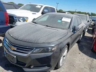 2014 Chevrolet Impala LT with VIN 1G1125S30EU118979, listed as a IAAI auction lot 40084364 with 145,015 mi miles and . Bid and sale history available at DreamBid. Image 6.
