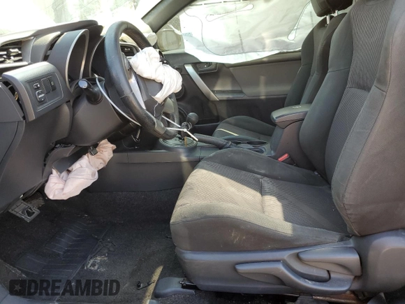 2012 Scion tC z VIN JTKJF5C79C3044194, wystawiony jako Copart lot #59359825 z przebiegiem 158 495 mil mil oraz Szkoda całkowita • Salvage title. Historia ofert i sprzedaży dostępna na DreamBid. Obrazek 7.