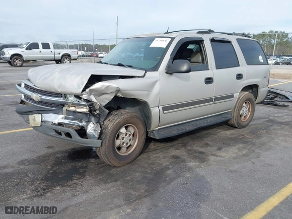 2004 Chevrolet Tahoe LT with VIN 1GNEC13Z34J258811, listed as a IAAI auction lot 41710156 with 322,462 mi miles. Bid and sale history available at carsss.com. Image 2.