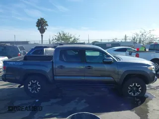 2020 Toyota Tacoma SR5 with VIN 3TMCZ5AN2LM351472, listed as a IAAI auction lot 41621286 with 48,402 mi miles and . Bid and sale history available at DreamBid. Image 13.