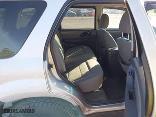 2006 Ford Escape XLT with VIN 1FMCU03166KB47650, listed as a IAAI auction lot 41529751 with 153,962 mi miles. Bid and sale history available at carsss.com. Image 8.
