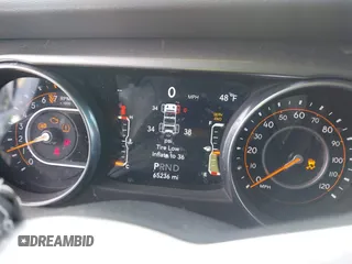 2018 Jeep Wrangler Unlimited Sahara with VIN 1C4HJXEG0JW246110, listed as a IAAI auction lot 41826662 with 65,236 mi miles. Bid and sale history available at carsss.com. Image 7.