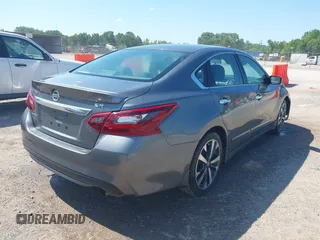 2017 Nissan Altima SV with VIN 1N4AL3AP5HC493702, listed as a IAAI auction lot 42661383 with 195,280 mi miles and . Bid and sale history available at DreamBid. Image 4.