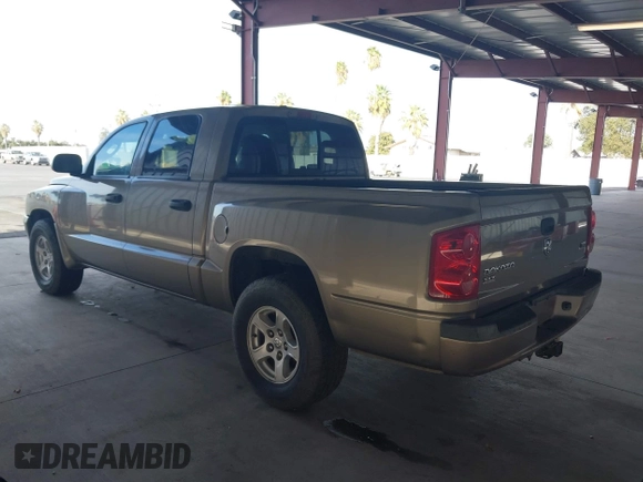 2007 Dodge Dakota SLT with VIN 1D7HE48N17S144088, listed as a IAAI auction lot 40577462 with 192,502 mi miles and . Bid and sale history available at carsss.com. Image 3.