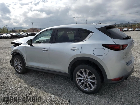 2020 Mazda CX-5 Grand Touring with VIN JM3KFADM5L0732193, listed as a Copart auction lot 51325385 with 86,798 mi miles and Salvage Title. Bid and sale history available at DreamBid. Image 2.