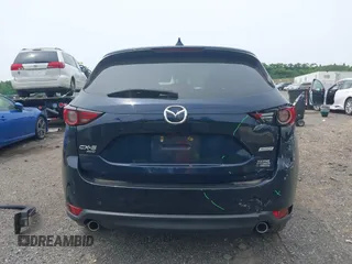 2018 Mazda CX-5 Grand Touring with VIN JM3KFBDMXJ0361812, listed as a IAAI auction lot 42509752 with 131,386 mi miles and . Bid and sale history available at DreamBid. Image 17.