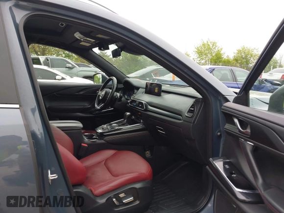 2023 Mazda CX-9 Grand Touring with VIN JM3TCBDY2P0636226, listed as a IAAI auction lot 42384360 with 161,352 mi miles and . Bid and sale history available at DreamBid. Image 5.