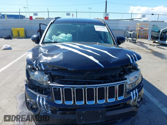 2016 Jeep Compass Latitude with VIN 1C4NJCEB2GD628384, listed as a IAAI auction lot 41752694 with 122,589 mi miles. Bid and sale history available at carsss.com. Image 12.